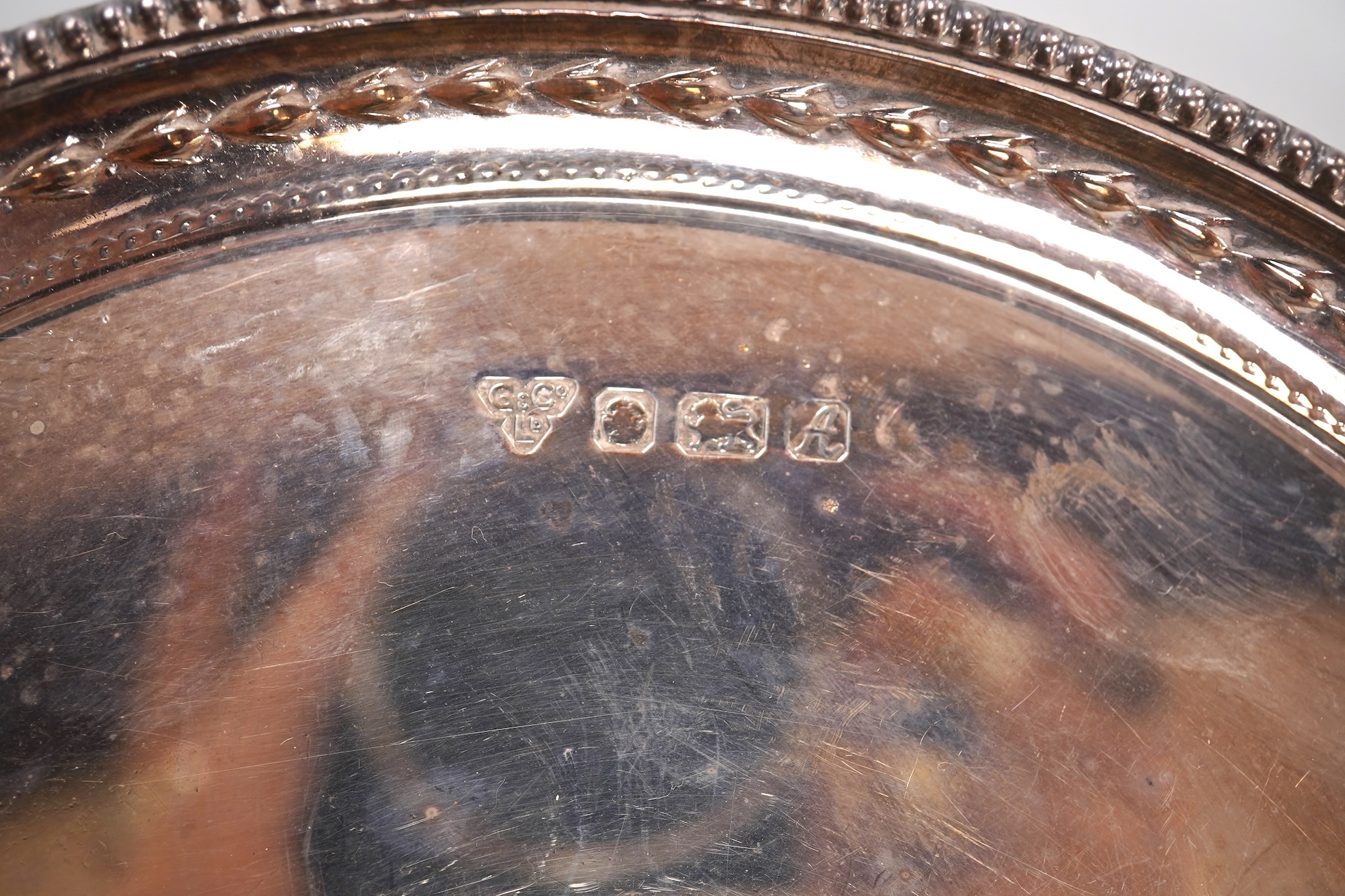 An Elizabeth II silver salver by Garrard & Co Ltd, London, 1975, with engraved inscription, diameter 20.2cm, 10.8oz.